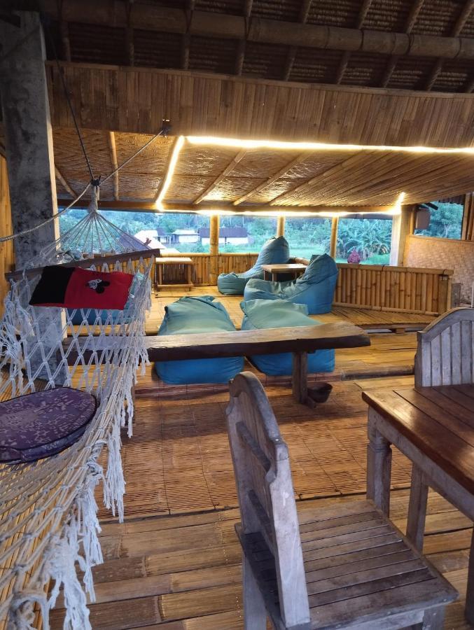 Amed Stop Inn Homestay, Rooftop Restaurant And Bar Exterior foto