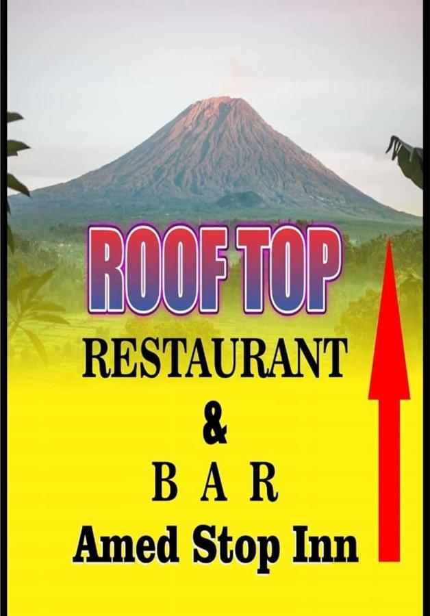 Amed Stop Inn Homestay, Rooftop Restaurant And Bar Exterior foto