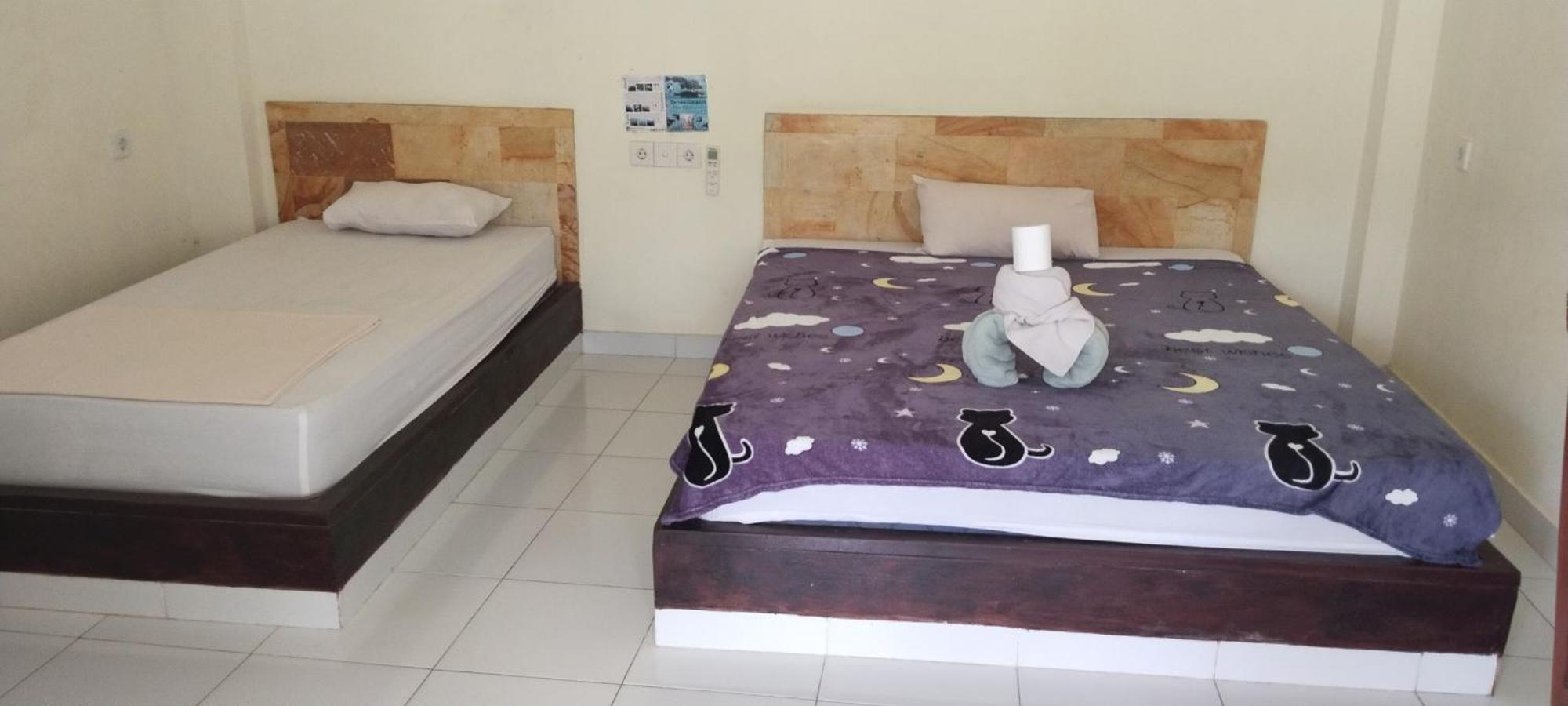 Amed Stop Inn Homestay, Rooftop Restaurant And Bar Exterior foto