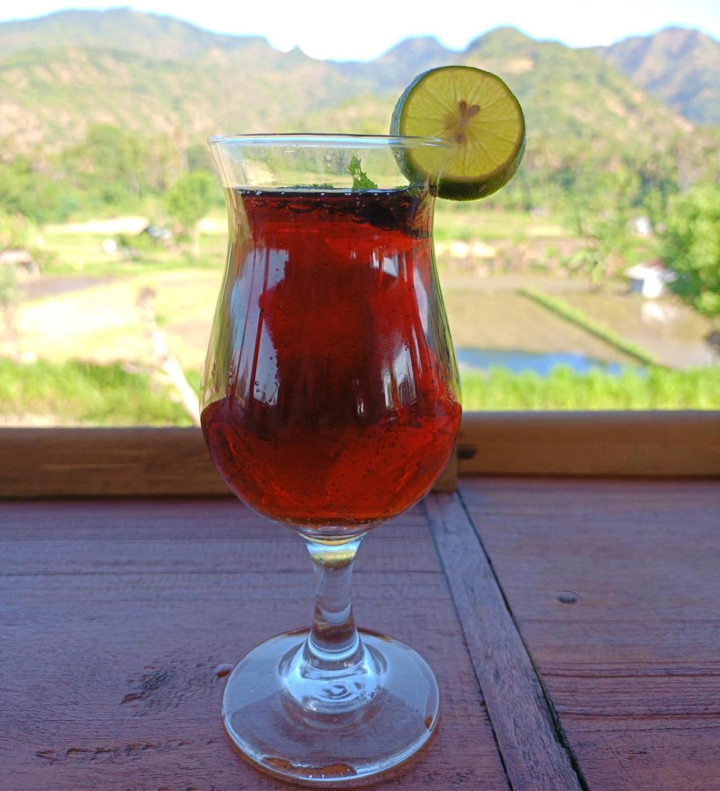 Amed Stop Inn Homestay, Rooftop Restaurant And Bar Exterior foto