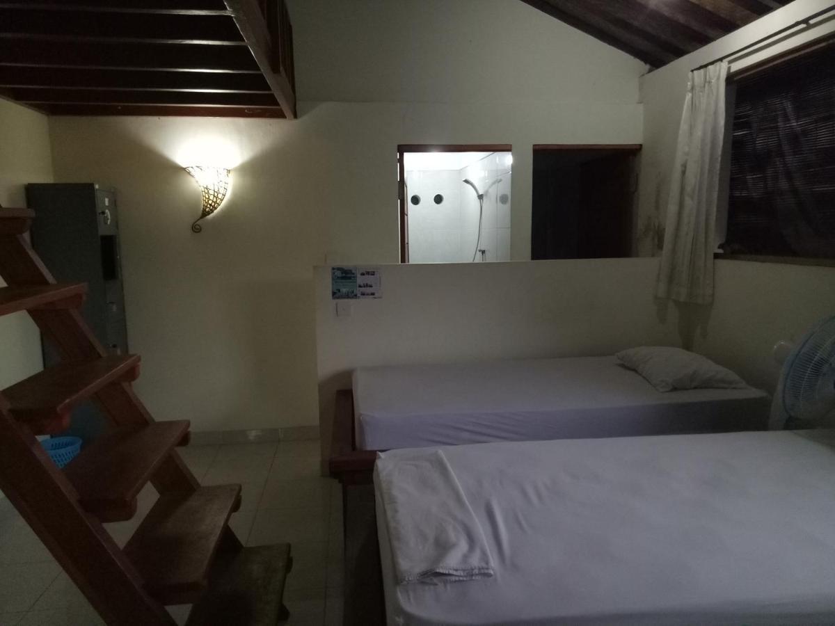 Amed Stop Inn Homestay, Rooftop Restaurant And Bar Exterior foto