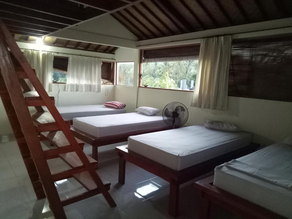 Amed Stop Inn Homestay, Rooftop Restaurant And Bar Exterior foto