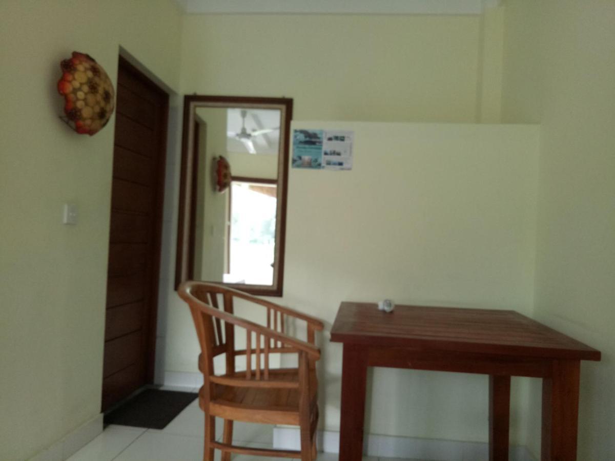 Amed Stop Inn Homestay, Rooftop Restaurant And Bar Exterior foto