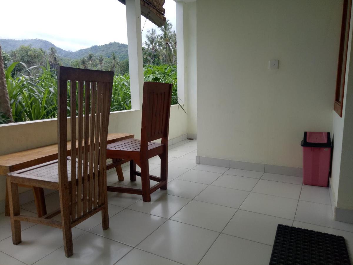 Amed Stop Inn Homestay, Rooftop Restaurant And Bar Exterior foto