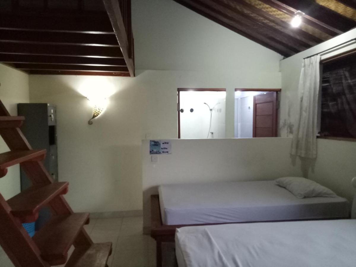 Amed Stop Inn Homestay, Rooftop Restaurant And Bar Exterior foto