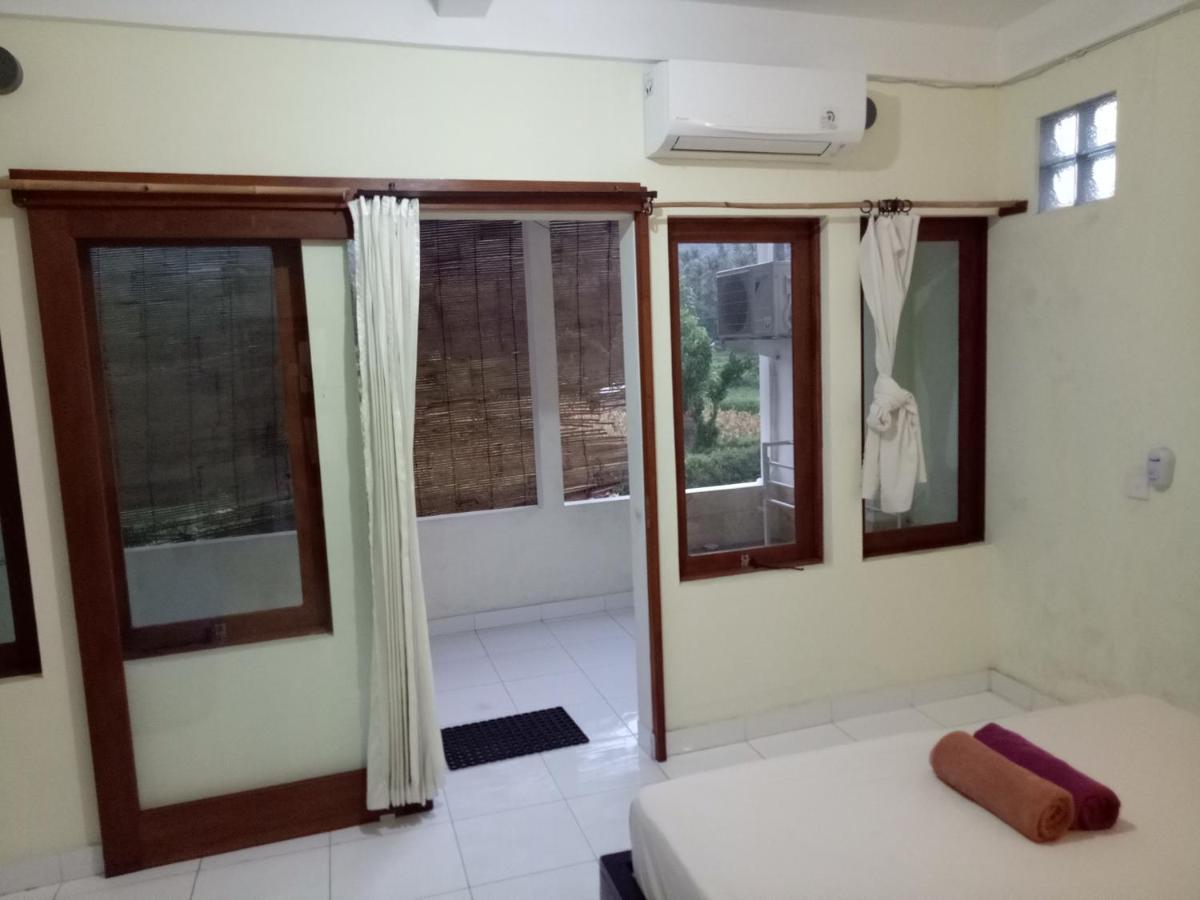 Amed Stop Inn Homestay, Rooftop Restaurant And Bar Exterior foto